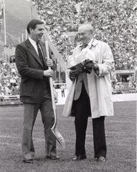 BYU President Jeffrey R. Holland and President Gordon B. Hinckley, Counselor in the First Presidency, visit at the groundbreaking ceremony to expand Cougar Stadium in 1981.