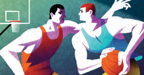 young men playing basketball