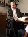 Man in wheelchair with scriptures