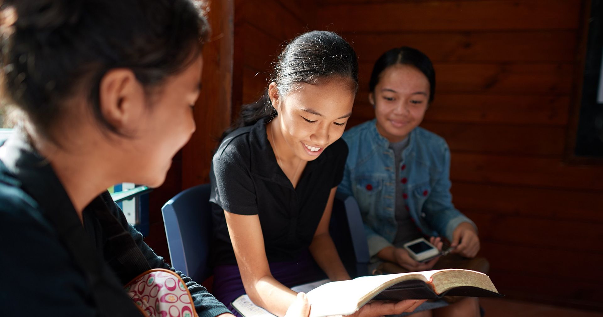 Samoan children reading scriptures in a Sunday School class.