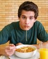 boy eating spaghetti