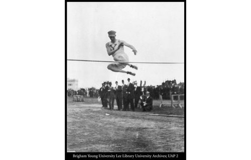 Alma Richards completing a high jump