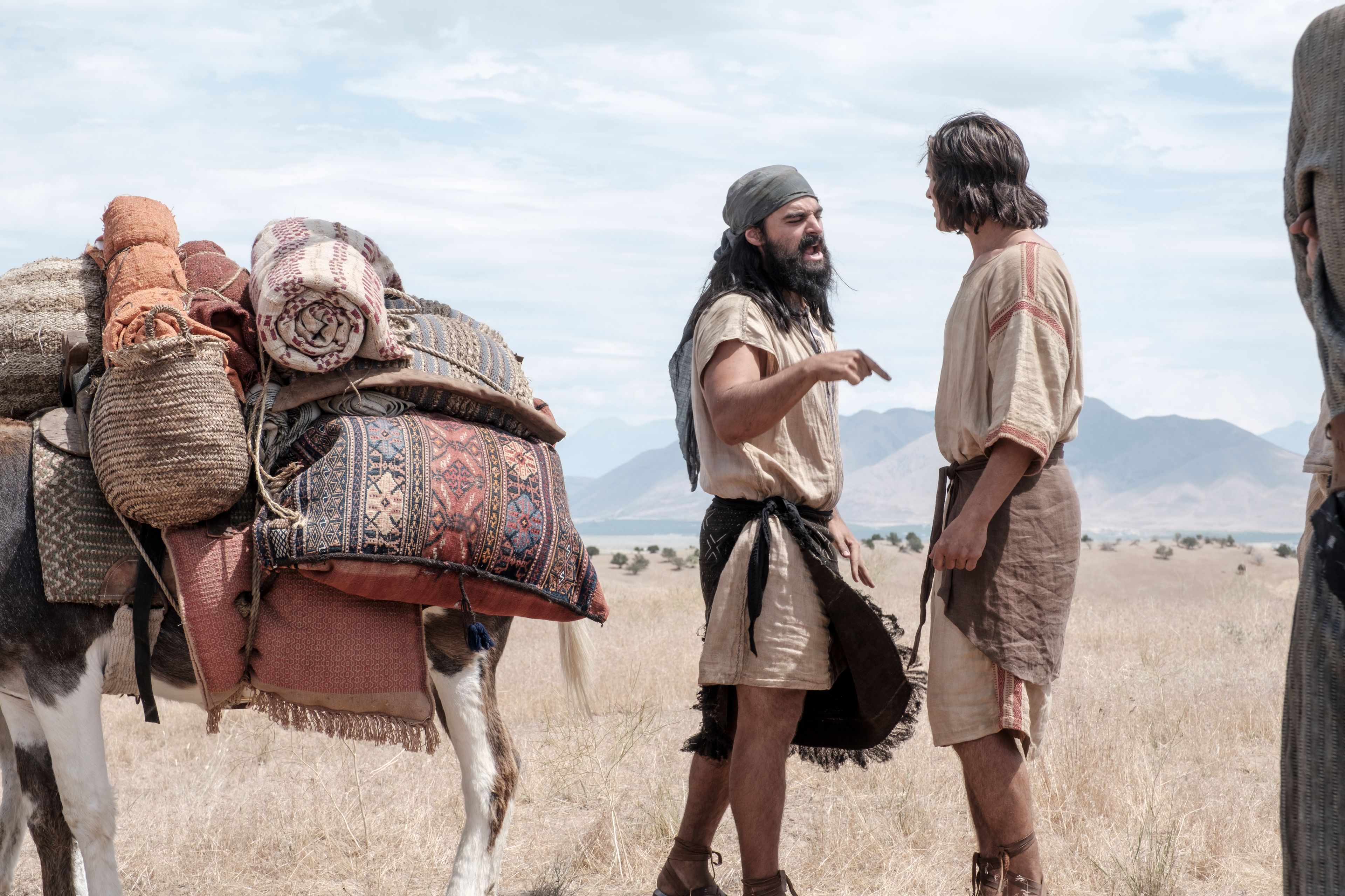 Laman and Nephi argue in the wilderness.