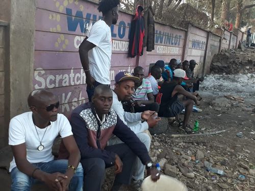 Brian Kigundu with youth