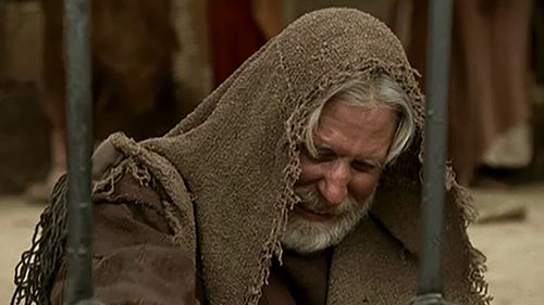 Mordecai wearing sackcloth