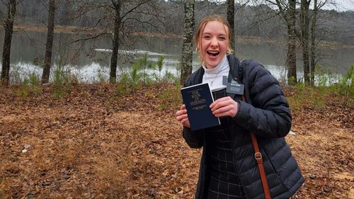 Sister Benson with Book of Mormon