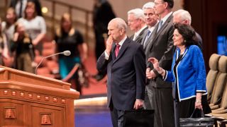 President Russell M. Nelson and Wendy Nelson exit the Conference Center for the President Russell M. Nelson Devotional on June 3, 2018. President Nelson blows a kiss to the audience.