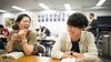 two young people laughing at the Nagoya, Japan, institute
