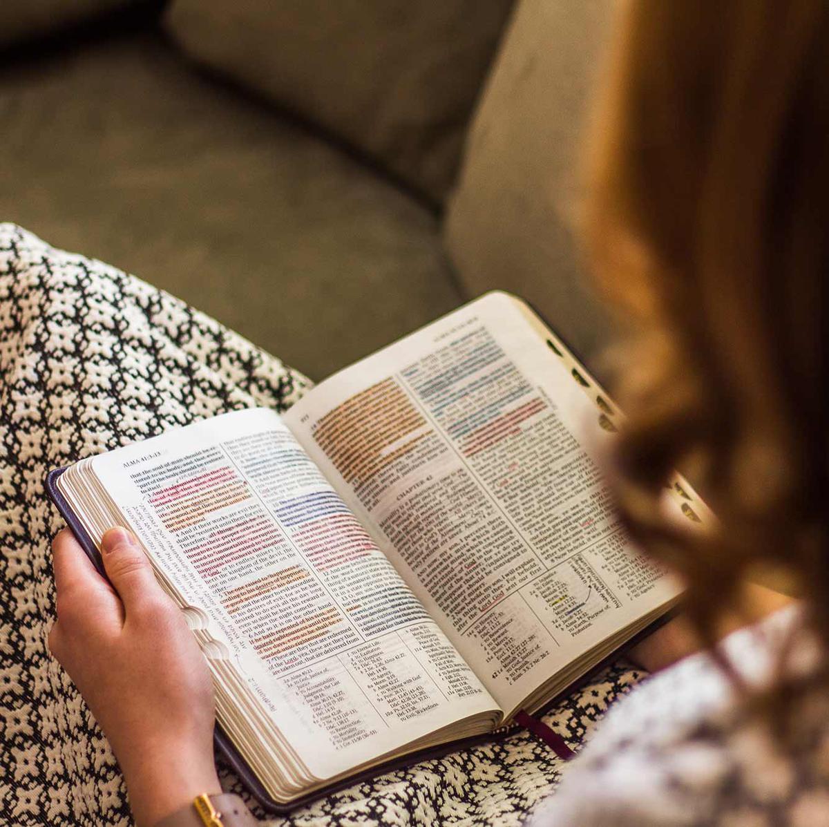 Woman reading scriptures